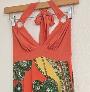 Vibrant Orange and Yellow Skirt with Green Accents